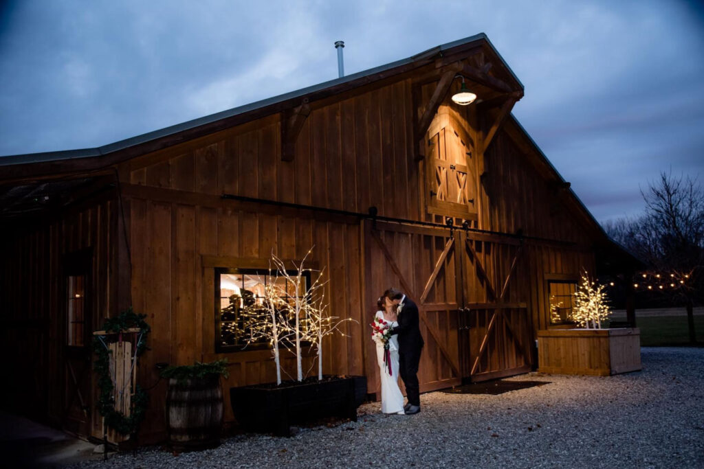 Bride and groom outside a barn at a Wedding Locations in Indianapolis