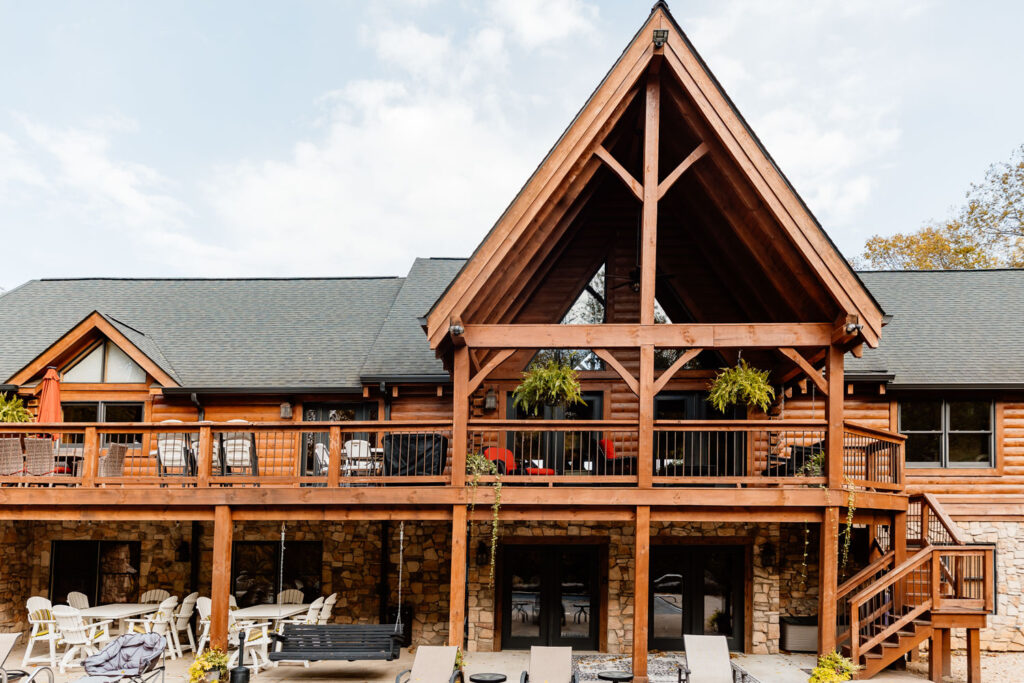 Lodge deck overlooking a fire pit and pool area at a wedding locations in Indianapolis