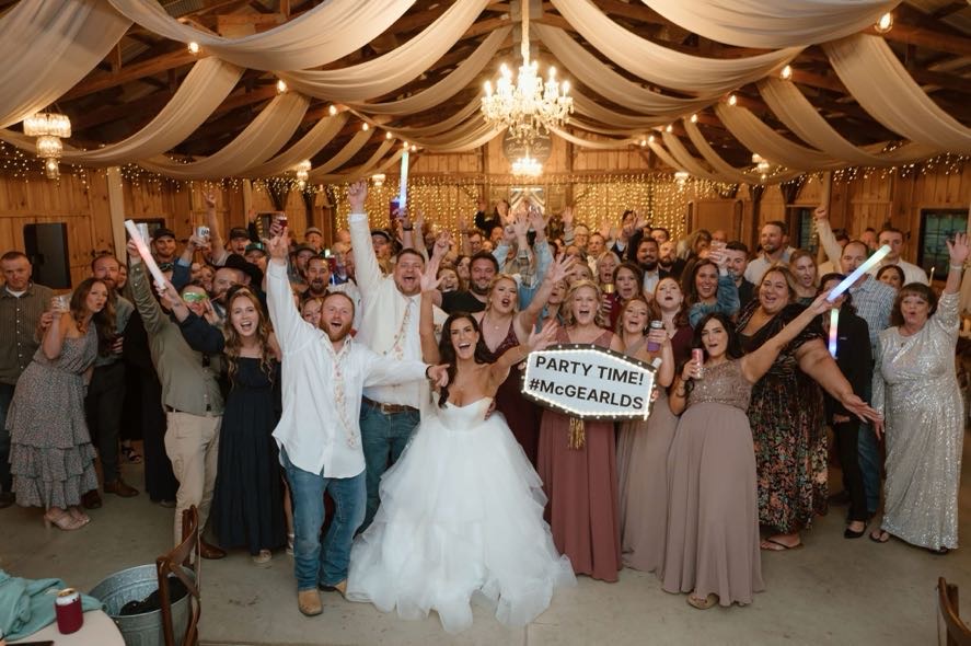 Katie and Austin's fall foliage wedding having fun with there guests