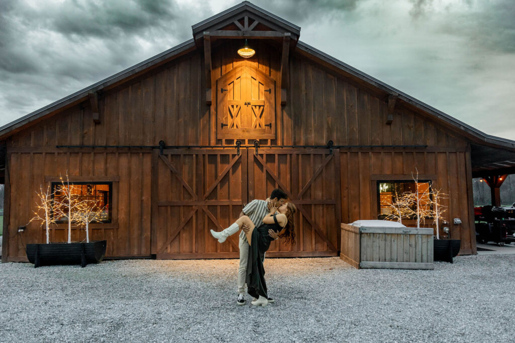 Couple dancing outside barn venue at an affordable wedding venue